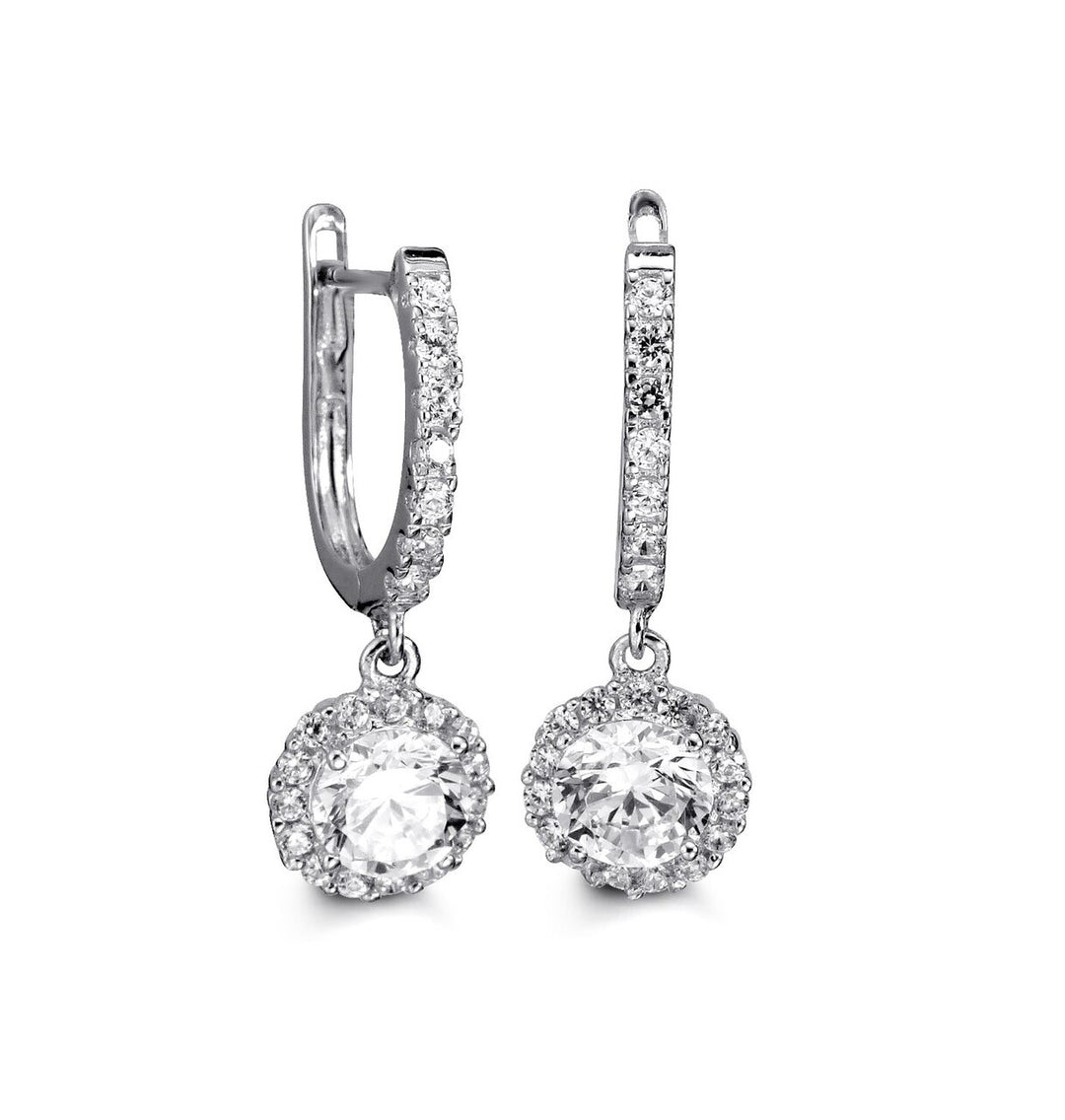 10K white gold huggie earrings with a round cubic zirconia drop, encased in a sparkling halo setting.
