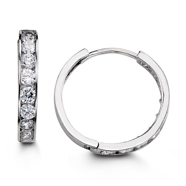 Elegant 14K white gold huggie earrings encrusted with sparkling cubic zirconia, offering a luxurious yet understated accessory option.