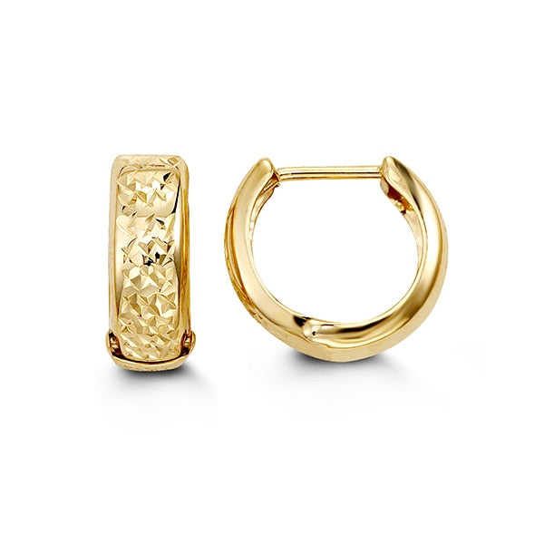 Sophisticated 10K yellow gold huggie earrings with a unique textured design, offering a luxurious and stylish addition to any jewelry collection.
