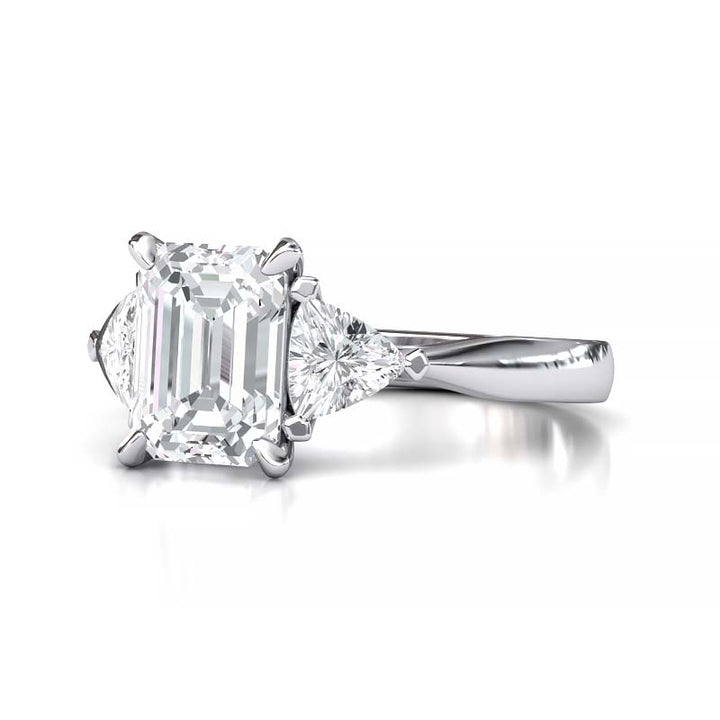 Exquisite 8x6mm Emerald-Cut Moissanite Three-Stone Ring with Tapered Band and Trapezoid Side Stones