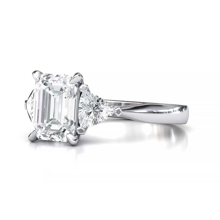 Exquisite 8x6mm Emerald-Cut Moissanite Three-Stone Ring with Tapered Band and Trapezoid Side Stones