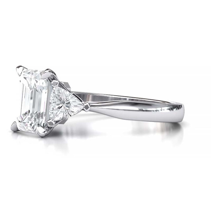 Exquisite 8x6mm Emerald-Cut Moissanite Three-Stone Ring with Tapered Band and Trapezoid Side Stones