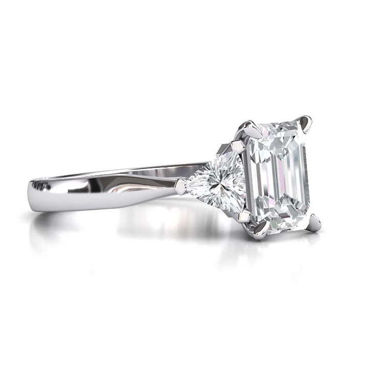 Exquisite 8x6mm Emerald-Cut Moissanite Three-Stone Ring with Tapered Band and Trapezoid Side Stones