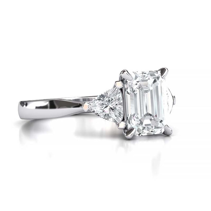 Exquisite 8x6mm Emerald-Cut Moissanite Three-Stone Ring with Tapered Band and Trapezoid Side Stones