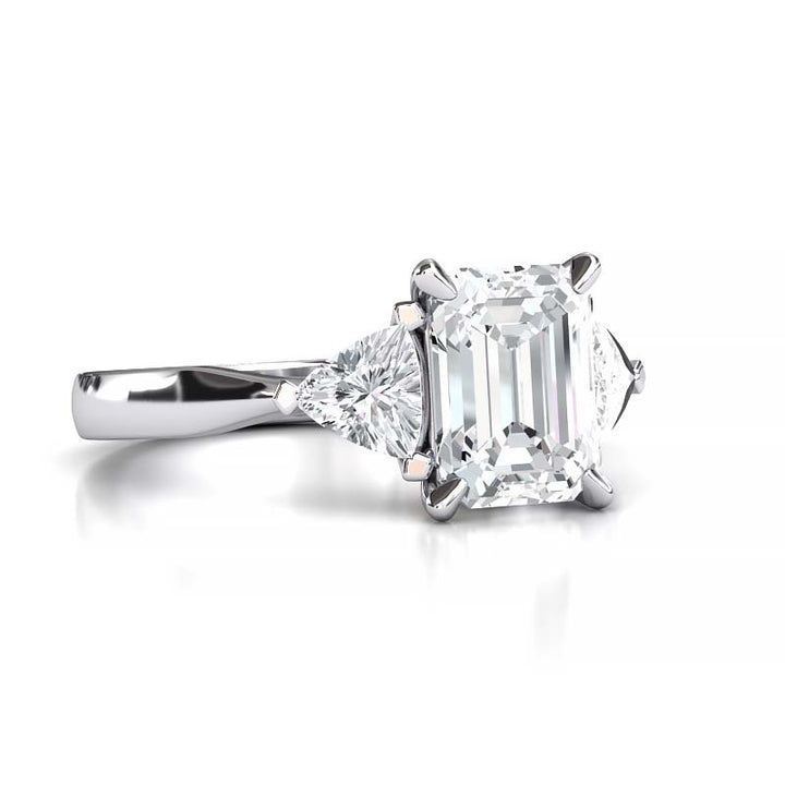 Exquisite 8x6mm Emerald-Cut Moissanite Three-Stone Ring with Tapered Band and Trapezoid Side Stones