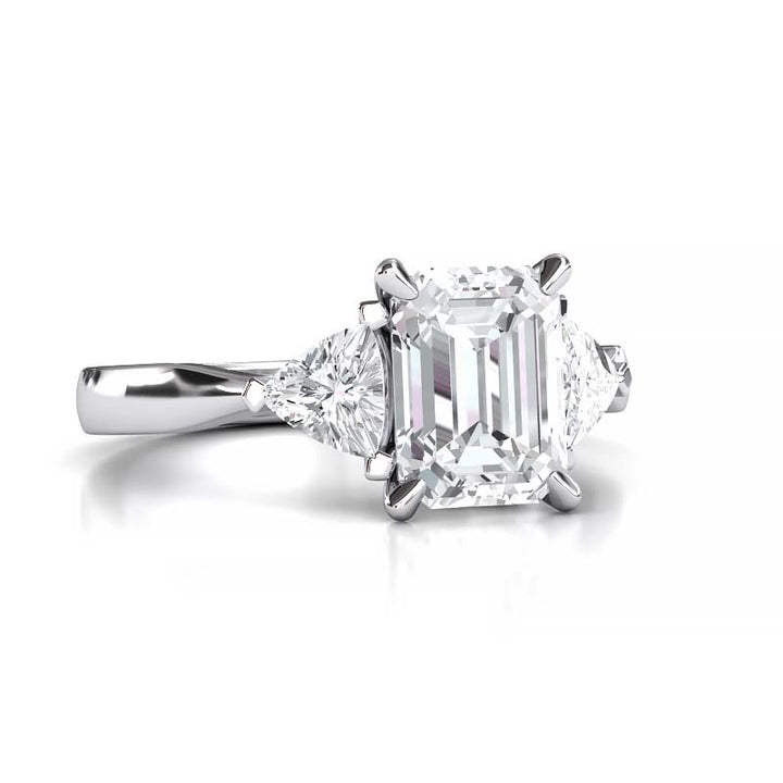 Exquisite 8x6mm Emerald-Cut Moissanite Three-Stone Ring with Tapered Band and Trapezoid Side Stones