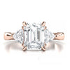 Exquisite 8x6mm Emerald-Cut Moissanite Three-Stone Ring with Tapered Band and Trapezoid Side Stones