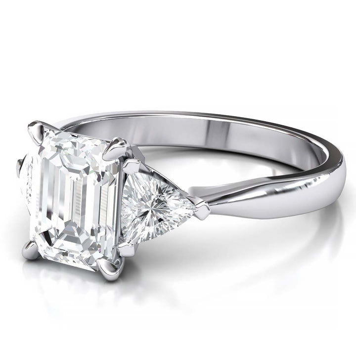 Exquisite 8x6mm Emerald-Cut Moissanite Three-Stone Ring with Tapered Band and Trapezoid Side Stones