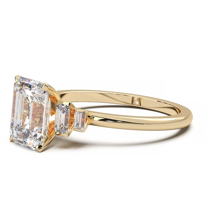 Exquisite 2.2ct Emerald-Cut Lab-Grown Yellow Diamond Engagement Ring with Flanking Baguettes Set in Lustrous Yellow Gold