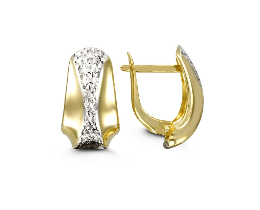 Elegant 10K yellow gold huggie earrings with a diamond accent set in white gold, designed for sophistication and comfort.
