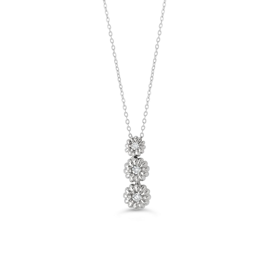 10K white gold pendant featuring three diamond-centered daisy flowers, symbolizing past, present, and future, with a total diamond weight of 0.053 ct on a sleek chain.