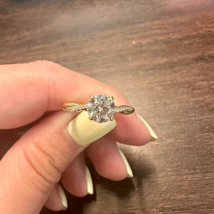 Lab grown diamond ring with 1 carat round center stone and accent diamonds in gold setting