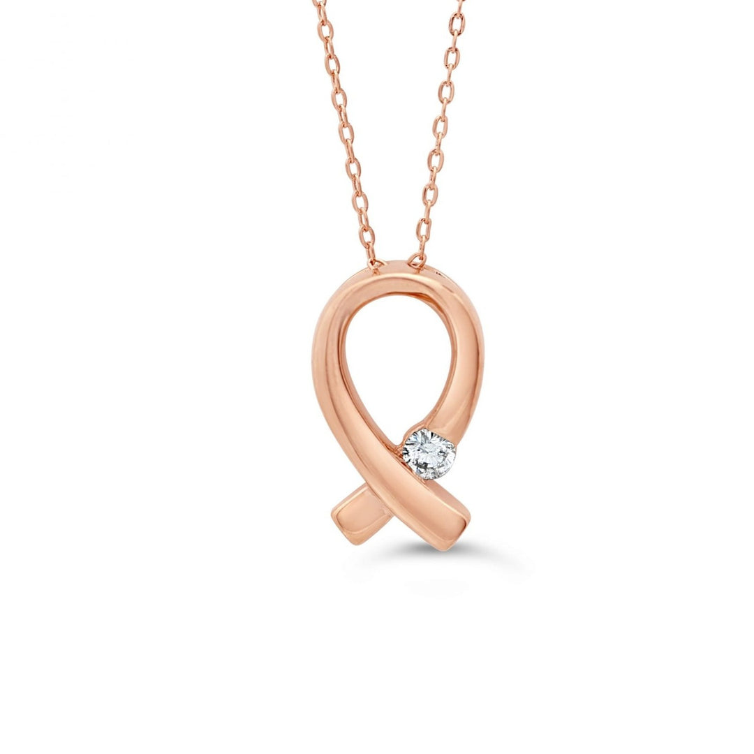 Elegant 10K rose gold pink ribbon pendant with a 0.035 ct diamond, symbolizing hope and support, complete with a matching rose gold chain.