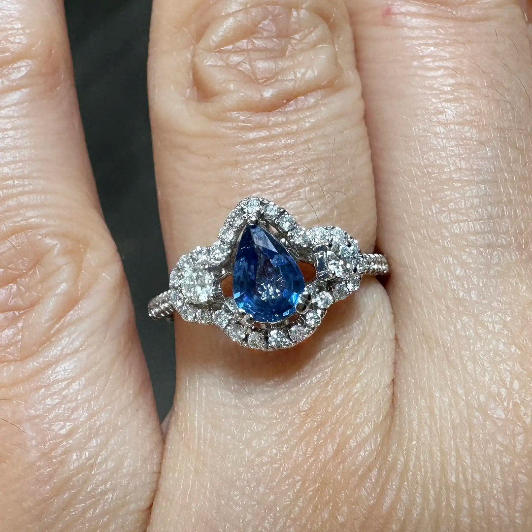 Dazzling 14K Gold Pear-Shaped Sapphire Ring with Halo and Side Diamonds