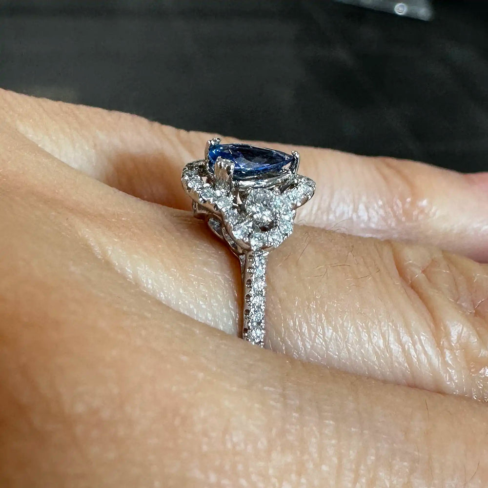 Dazzling 14K Gold Pear-Shaped Sapphire Ring with Halo and Side Diamonds
