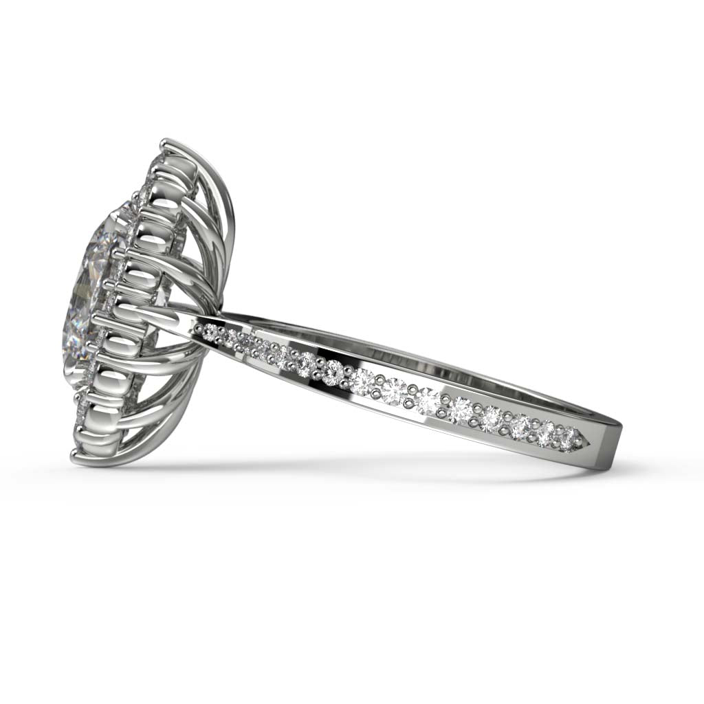 2CT oval moissanite halo engagement ring with pavé band in 14K gold.