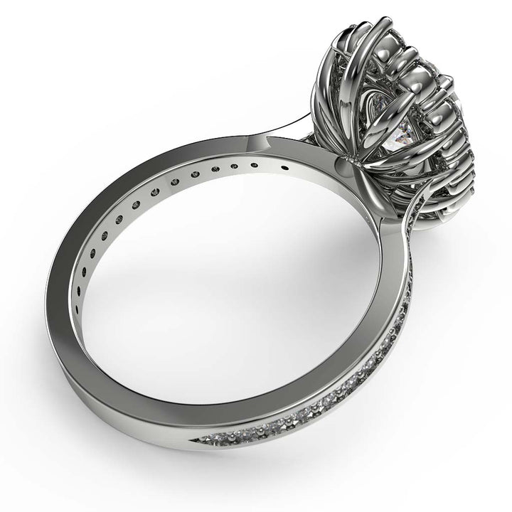 2CT oval moissanite halo engagement ring with pavé band in 14K gold.