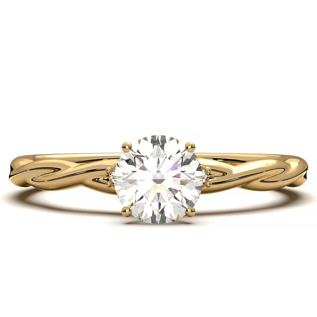 Twisted solitaire engagement ring with a large center diamond and two smaller side diamonds.