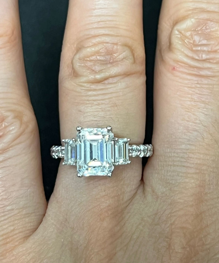 Chic 14K Gold Emerald Cut Moissanite Ring with Side Stones