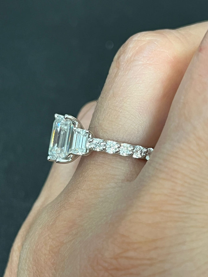 Chic 14K Gold Emerald Cut Moissanite Ring with Side Stones