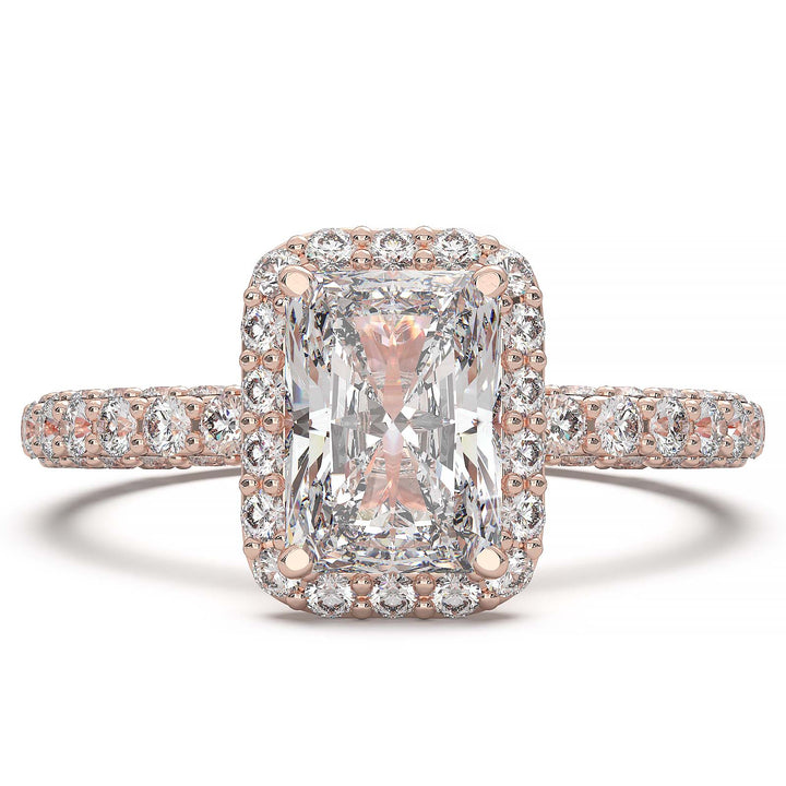 A 1.2-carat radiant-cut lab-grown diamond halo ring featuring a halo and triple row diamond band