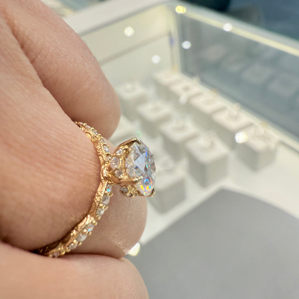 1.3 Ct round moissanite engagement ring with hidden halo in 14K gold.