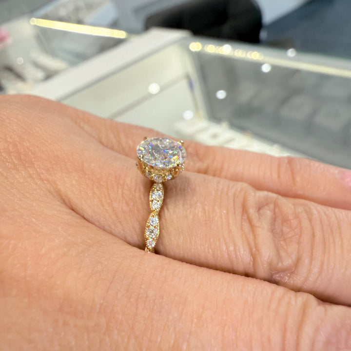 1.3 Ct round moissanite engagement ring with hidden halo in 14K gold.