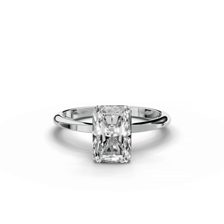 Radiant diamond engagement ring with hidden halo in white gold.