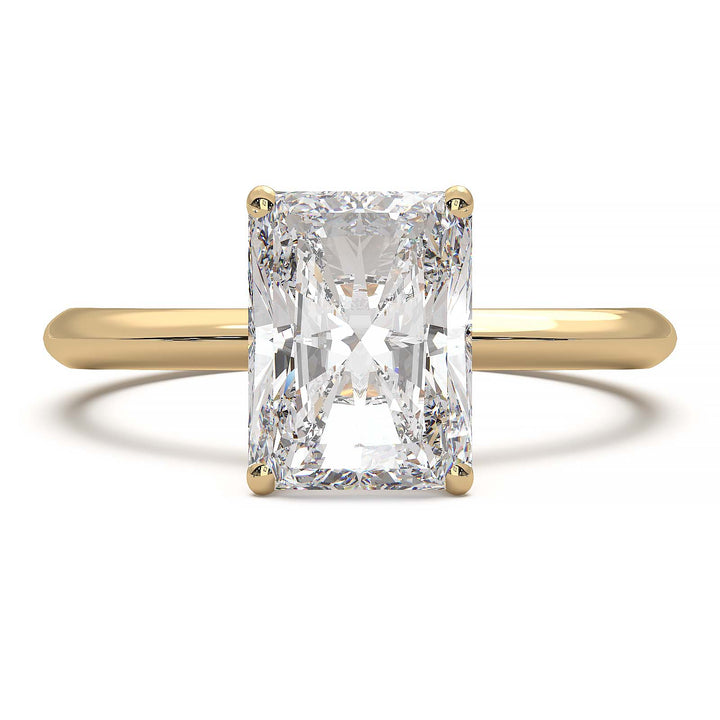 Radiant cut lab diamond solitaire ring with a low-profile setting and custom prongs.