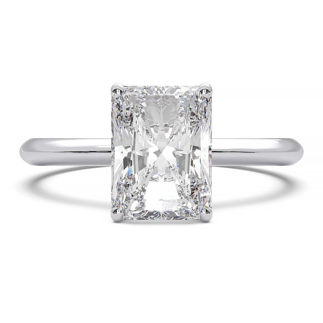 Radiant cut lab diamond solitaire ring with a low-profile setting and custom prongs.