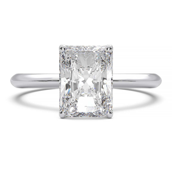 Radiant cut lab diamond solitaire ring with a low-profile setting and custom prongs.