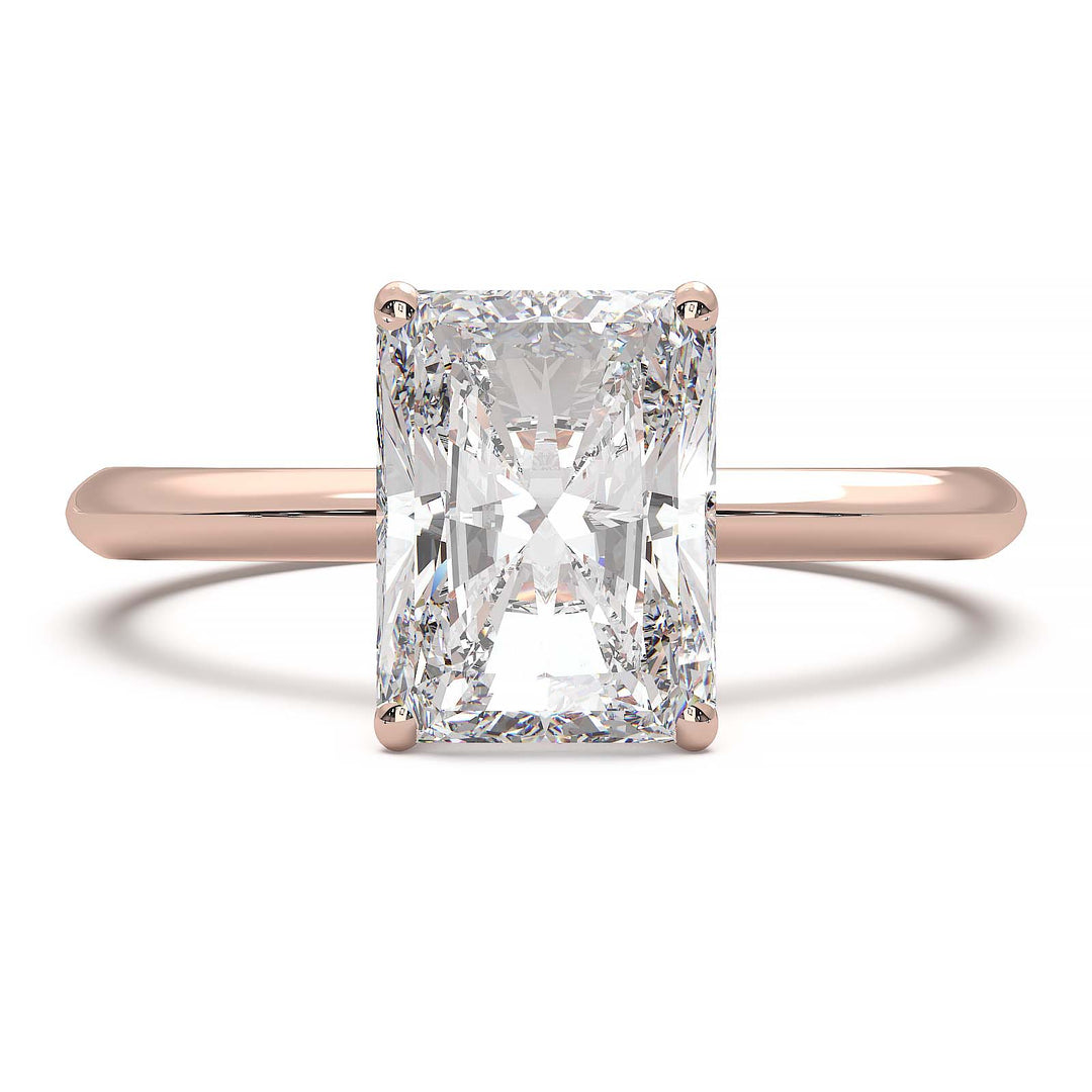 Radiant cut lab diamond solitaire ring with a low-profile setting and custom prongs.