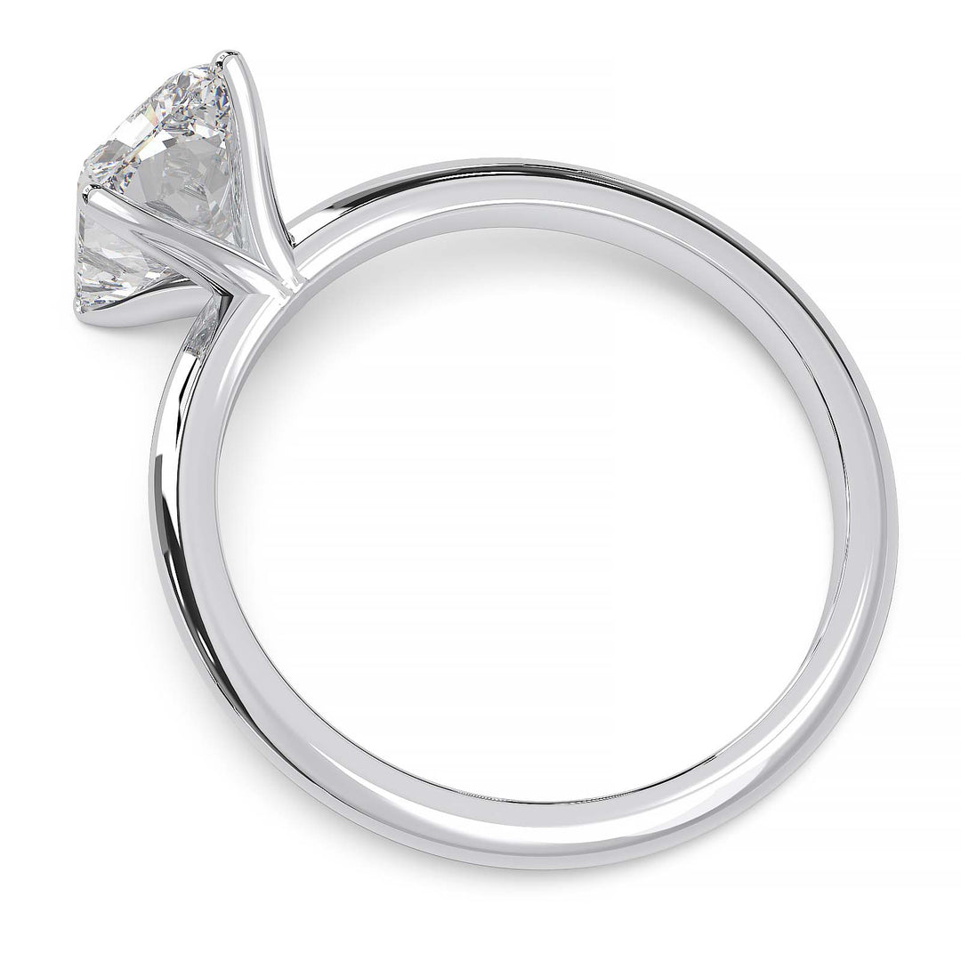 Radiant cut lab diamond solitaire ring with a low-profile setting and custom prongs.
