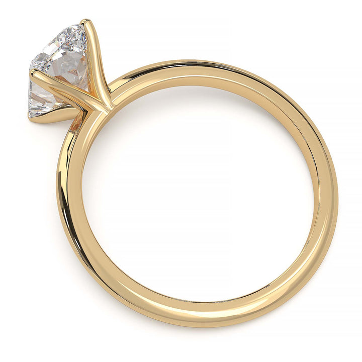 Radiant cut lab diamond solitaire ring with a low-profile setting and custom prongs.