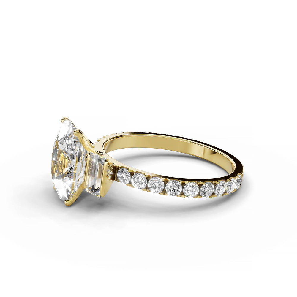 Cushion cut diamond engagement ring with baguette and round diamonds in yellow gold.