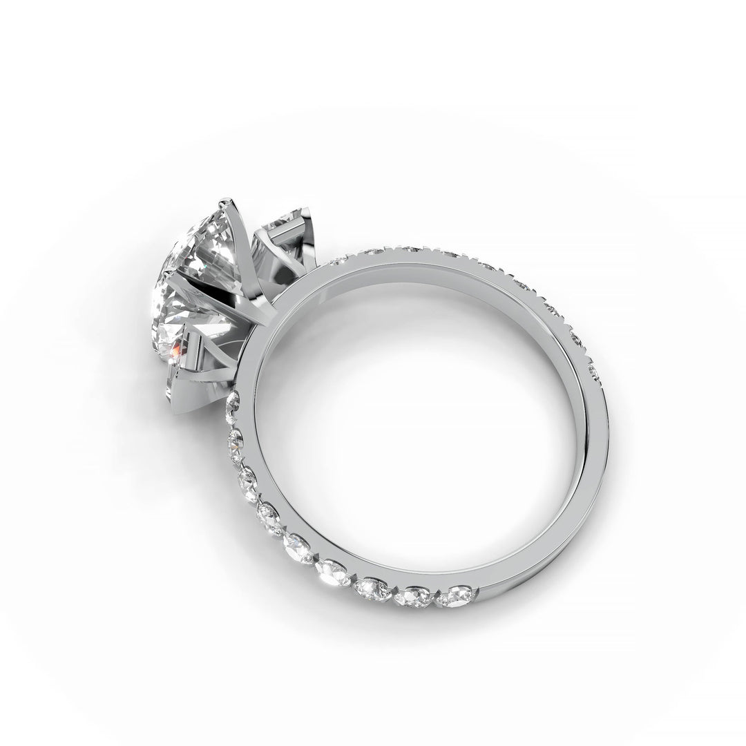 Cushion cut diamond engagement ring with baguette and round diamonds, modern style, white gold.
