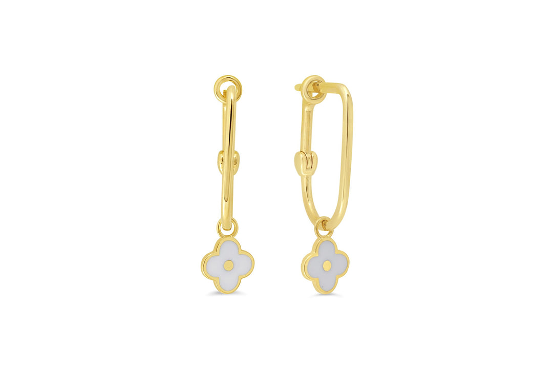 Pair of 10K yellow gold huggie earrings from RUDIX JEWELLERY, featuring hoops with attached floral charms with white and yellow enamel centers.