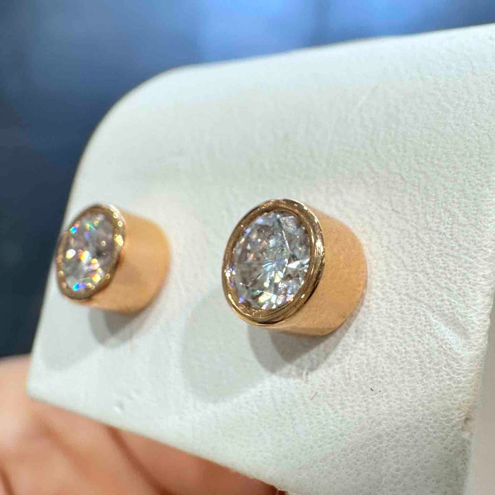 10K rose gold stud earrings with 6mm high-quality moissanite stones and strong butterfly backings, custom-made design.