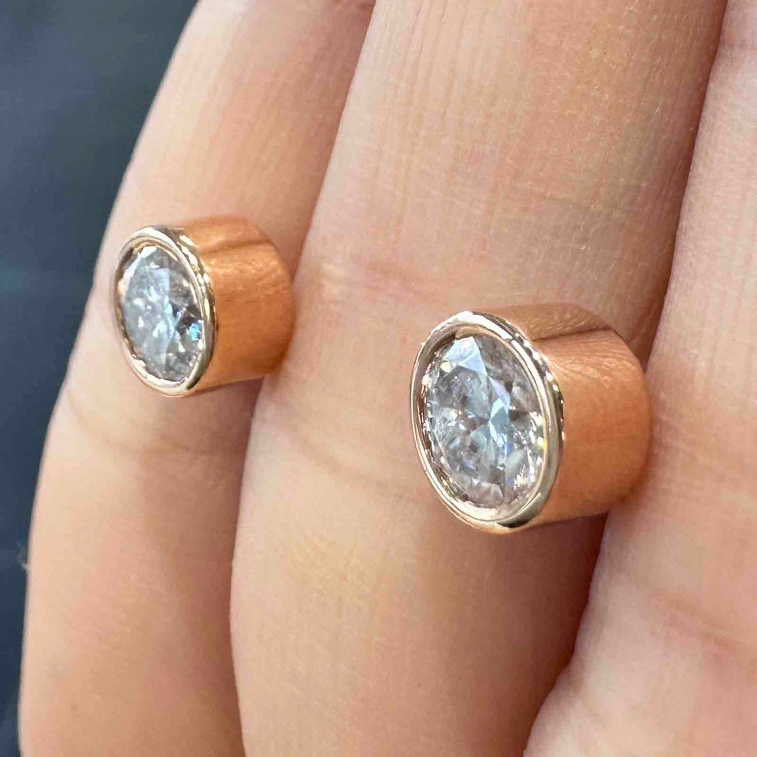 10K rose gold stud earrings with 6mm high-quality moissanite stones and strong butterfly backings, custom-made design.