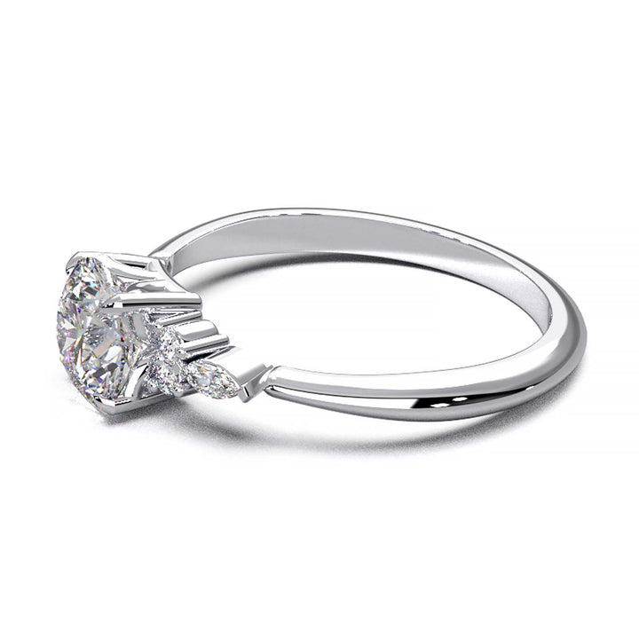 Elegant 0.6ct Round Lab-Grown Diamond Engagement Ring with Side Marquise and Round Accents.