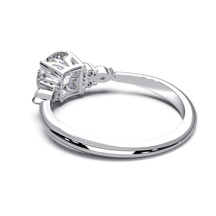 Elegant 0.6ct Round Lab-Grown Diamond Engagement Ring with Side Marquise and Round Accents.