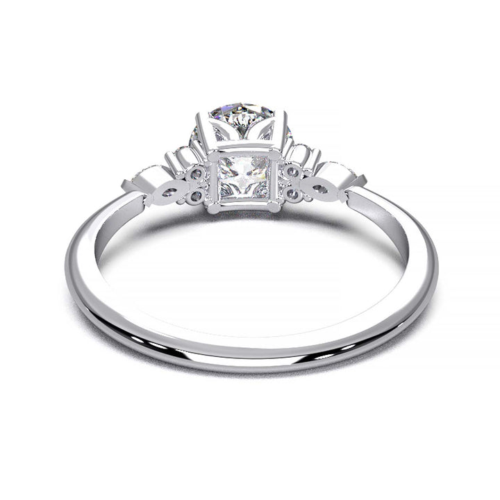 Elegant 0.6ct Round Lab-Grown Diamond Engagement Ring with Side Marquise and Round Accents.