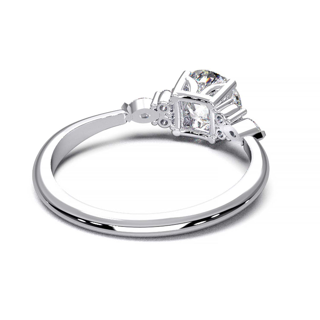 Elegant 0.6ct Round Lab-Grown Diamond Engagement Ring with Side Marquise and Round Accents.