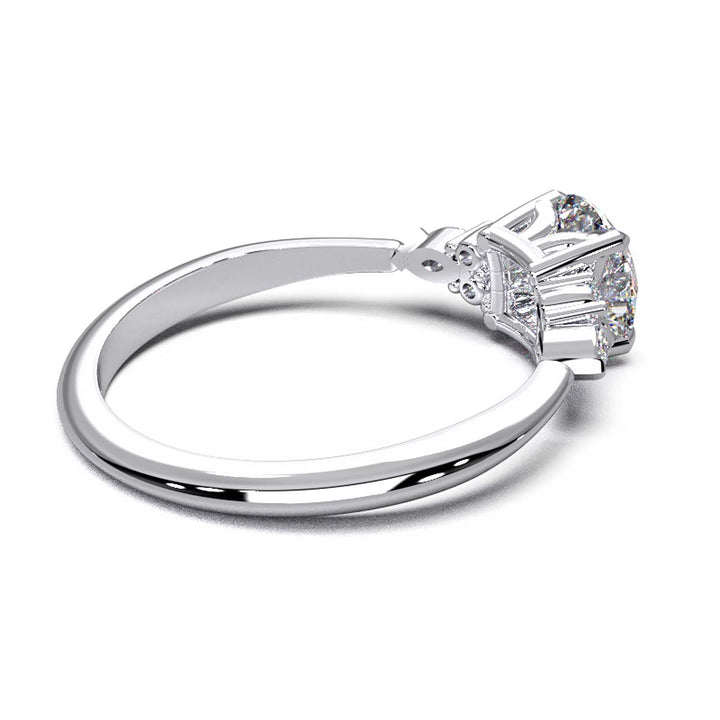 Elegant 0.6ct Round Lab-Grown Diamond Engagement Ring with Side Marquise and Round Accents.