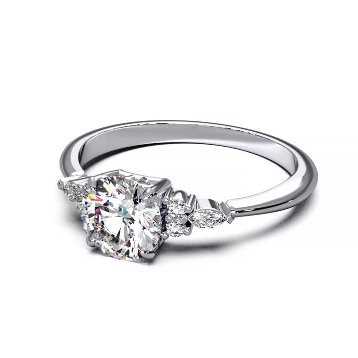 Elegant 0.6ct Round Lab-Grown Diamond Engagement Ring with Side Marquise and Round Accents.