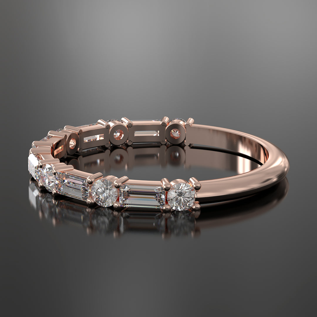 Lab-grown diamond wedding band with baguette and round stones in shared prong setting.
