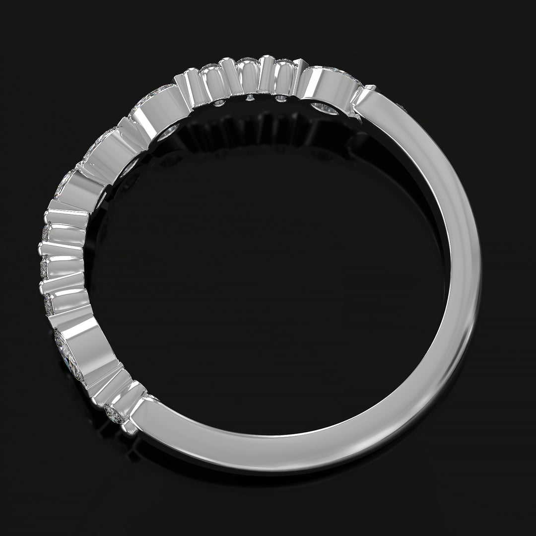 Curved wedding band with marquise and round lab-grown diamonds in a floating design with shared prongs.