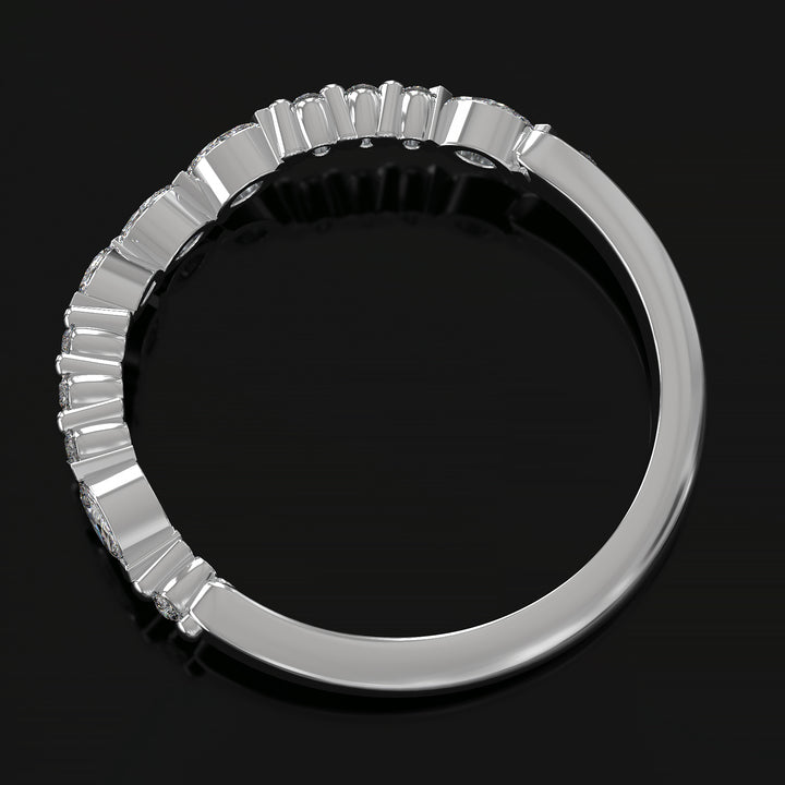 Curved wedding band with marquise and round lab-grown diamonds in a floating design with shared prongs.