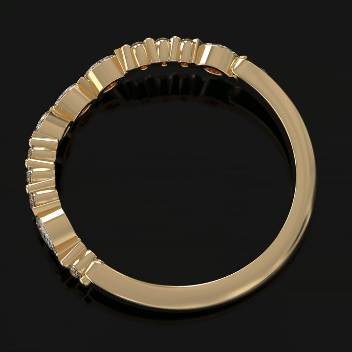 Curved wedding band with marquise and round lab-grown diamonds in a floating design with shared prongs.