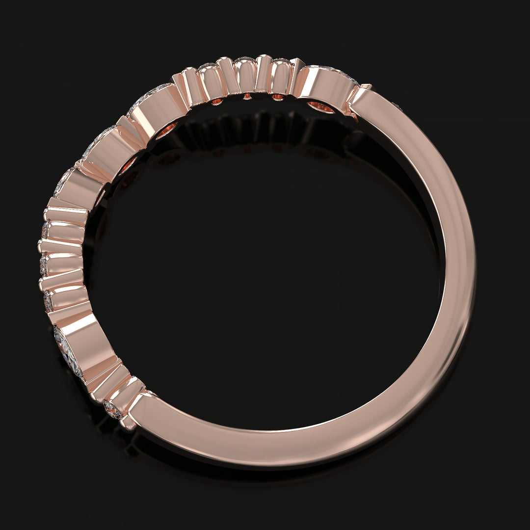 Curved wedding band with marquise and round lab-grown diamonds in a floating design with shared prongs.
